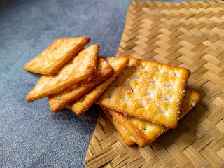 Sweet Crunchy Crackers isolated on abstract background.