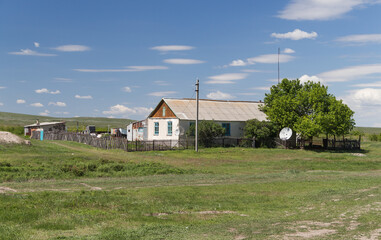 Lonely house in the village. An empty village in Kazakhstan. A disappearing village.