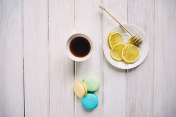 tea, lemon, honey and macaroons
