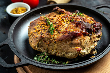 Roasted sliced Christmas ham of turkey. large piece of baked pork with mustard. banner, menu recipe, top view