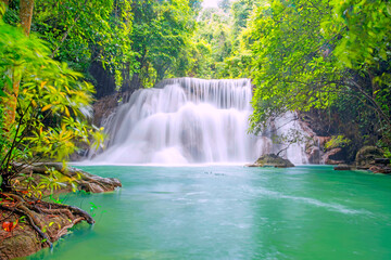 Fototapeta na wymiar Huay Mae Khamin Waterfall, 3th floor, waterfall in the national park Beautiful landscape waterfalls in a tropical rainforest in Kanchanaburi. Thailand.