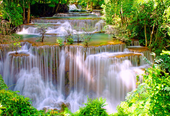 Fototapeta na wymiar Huay Mae Khamin Waterfall, 4th floor, waterfall in the national park Beautiful landscape waterfalls in a tropical rainforest in Kanchanaburi. Thailand.
