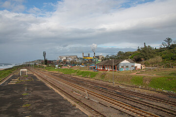 Fototapeta na wymiar Old Railway Tracks with Dilapidated Unused Platform