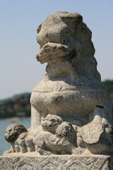 statue of a lion at the summer palace in beijing (china)