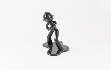 Figure of a man in a helmet on a white background