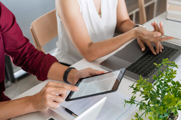 Young woman and man studying for a test or exam Tutor books with friends catching up and learning,...