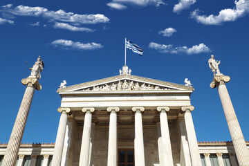 Fototapeta na wymiar Beautiful neoclassic Academy of Athens public landmark building with beautiful spring clouds and deep blue sky, Athens historic centre, Attica, Greece