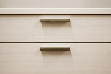 Image of a white chest of drawers
