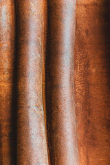 Hintergrund Wand aus Metall rostig wellig in braun orange
