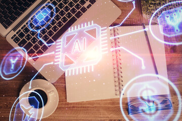 Multi exposure of data theme drawing hologram over topview work desk background with computer. Concept of technology.
