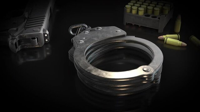 Metal Handcuffs and bullet - rotation - 3d animation model on a black background