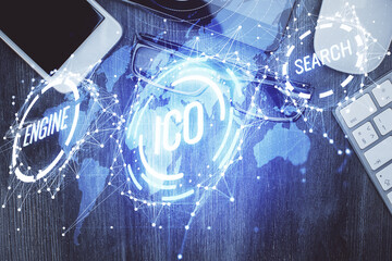 Double exposure of blockchain theme hologram over table with phone. Top view. Crypto technology concept.