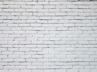 Background. Brick wall painted with white paint.