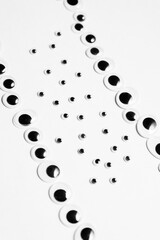 Parallel lines from toy eyes on white background