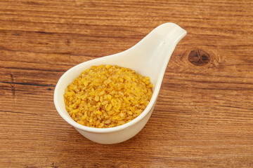 Vegetarian cuisine - dry bulgur for cooking