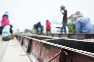 Road island construction By installing concrete formwork (blurry image)