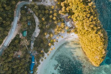 Beautiful Aerial Drone Shot View of an Amazing Island White Sand Beach in a Tropical Exotic Island in the Philippines. Fun Holiday Summer Vacation with Blue Water
