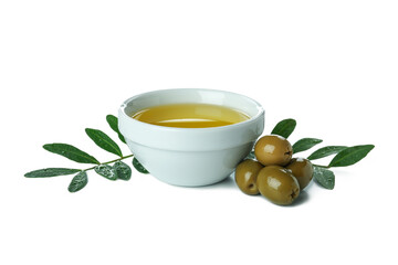 Obraz na płótnie Canvas Bowl of olive oil, twigs and olives isolated on white background