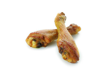 Roast chicken drumsticks isolated on white background
