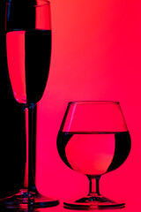 Two Glass Cups in One Line With Vivid  Colorful Background.