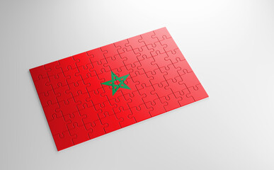A jigsaw puzzle with a print of the flag of Morocco, pieces of the puzzle isolated on white background. Fulfillment and perfection concept. Symbol of national integrity. 3D illustration.