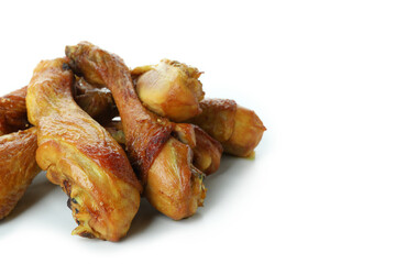 Roast chicken drumsticks isolated on white background