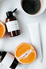 Natural skincare mockup bottles, add your own logo or text with orange. Healthy, organic skincare 
