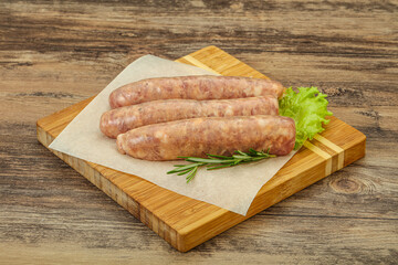 Raw pork meat sausages for grill