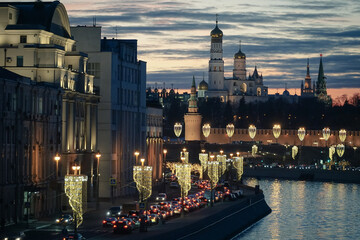 View of the Kremlin and Raushskaya Embankment in the evening