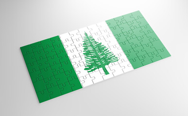Fototapeta na wymiar A jigsaw puzzle with a print of the flag of Norfolk Island, pieces of the puzzle isolated on white background. Fulfillment and perfection concept. Symbol of national integrity. 3D illustration.