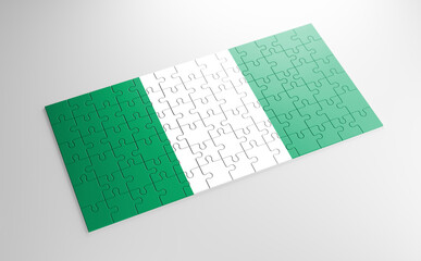 Fototapeta na wymiar A jigsaw puzzle with a print of the flag of Nigeria, pieces of the puzzle isolated on white background. Fulfillment and perfection concept. Symbol of national integrity. 3D illustration.