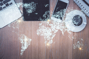 Double exposure of social network theme drawing over table with phone. Top view. People connecting...