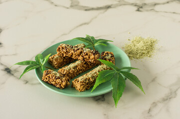 Homemade Chocolate protein bars with hemp seeds and dates. Healthy vegan food.
