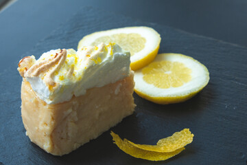 slice of lemon cake with cream