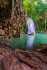 Waterfall in tropical forest at Erawan National Park, Thailand.The beautiful and famous waterfall in deep forest, kanchanaburi province.