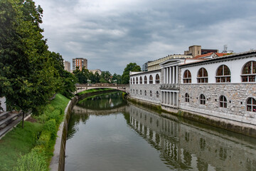 Fototapeta na wymiar Reflections in a river in Ljubljana