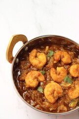 Indian food- Prawns masala or shrimp curry. Also known as Kolambi che Kalvan in Marathi. Chingri fry. Maharashtrian Prawns curry. Copy space.