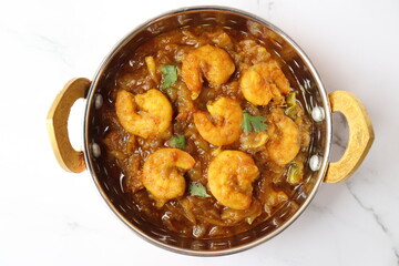 Indian food- Prawns masala or shrimp curry. Also known as Kolambi che Kalvan in Marathi. Chingri fry. Maharashtrian Prawns curry. Copy space.