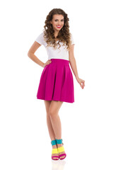 Happy Young Woman In Colorful High Heels, Pink Mini Skirt And White Top