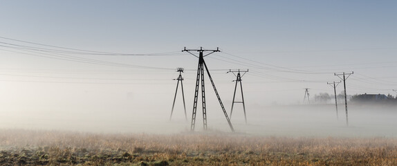 POWER ENGINEERING - High-voltage line fastened on a great tower truss
