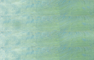 Green wooden surface background texture, with copy space for your text and design. Top view.