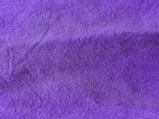 Background texture of fabric cotton linen purple color. Copy space for your text and design. Textile concept and soft backdrop.