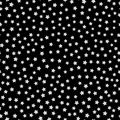 Cute pattern in small flower. Small colored flowers on dark background