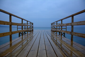 blue dock on a rainy day