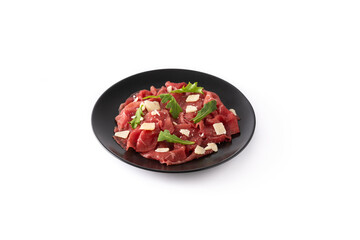 Marbled beef carpaccio on black plate isolated on white background