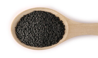 Black sesame seeds pile in wooden spoon isolated on white background, top view