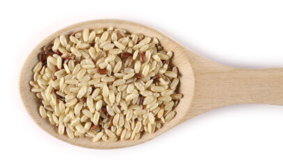 Integral rice pile in wooden spoon isolated on white background, top view