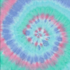 Pastel abstract swirl tie dye pattern. Spiral batik background. Boho, grunge style.