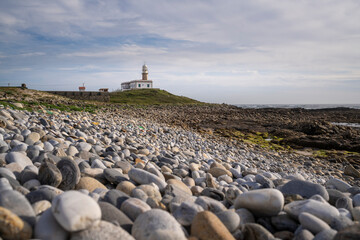 Fototapeta na wymiar Lariño or Punta Insua lighthouse in Carnota, Galicia, Spain