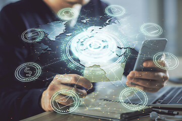 Double exposure of man's hands holding and using a phone and social network theme drawing.